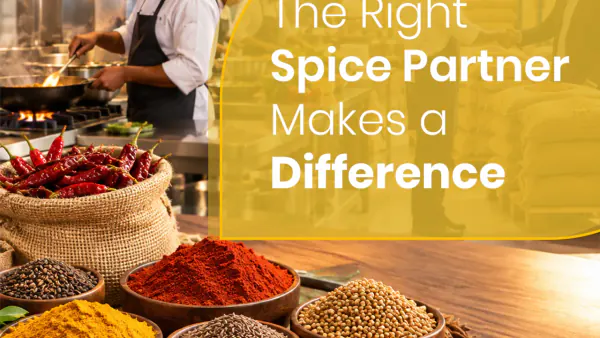 Fragrant South Indian dum biryani garnished with mint, fried onions and whole spices in a copper handi